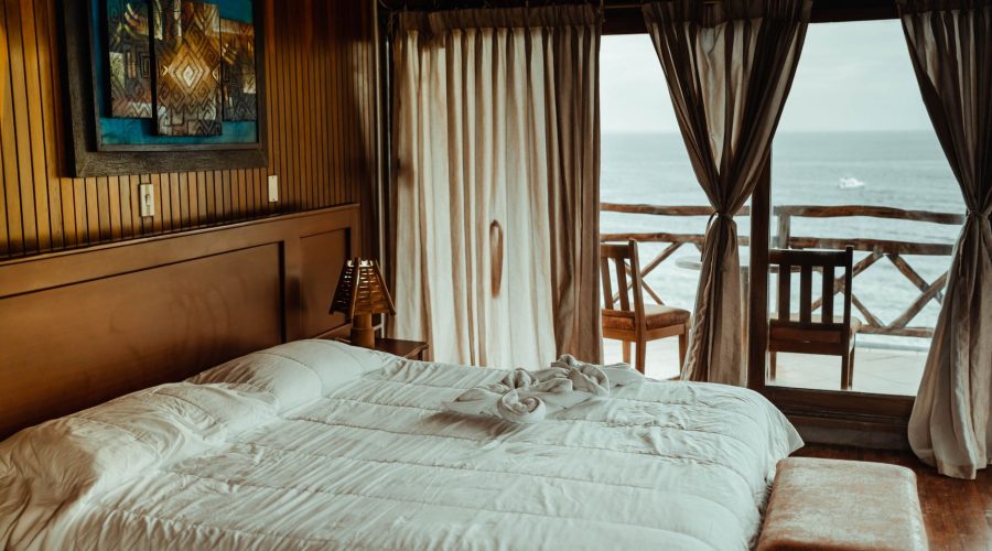 Luxurious seaside bedroom featuring a plush bed, elegant decor, and stunning ocean view for a serene escape. — Choosing the b