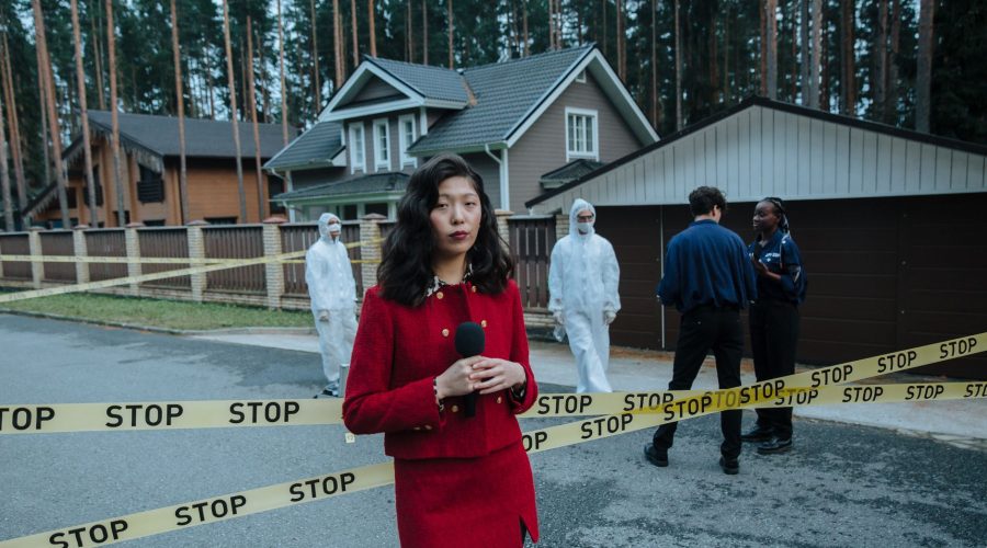 Journalist reporting from a crime scene with STOP tape and forensic team in the background. — Networking at the Bar: How to F